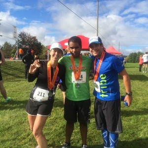 At the Collingwood half-marathon finish line with fellow Tribe Fitness runners. Image via Tribe Fitness Facebook page.